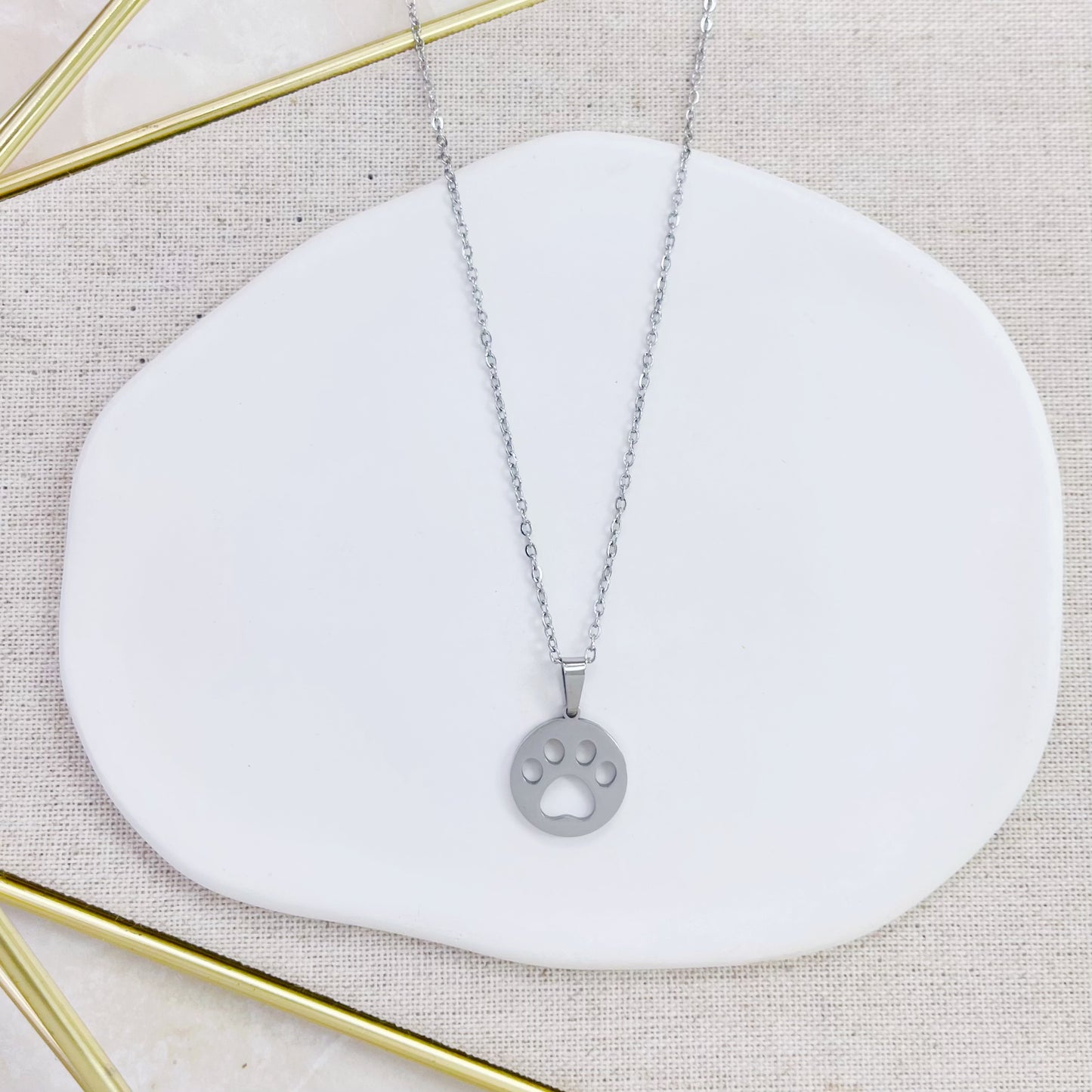 110N-061 DOG PAW PENDANT NK